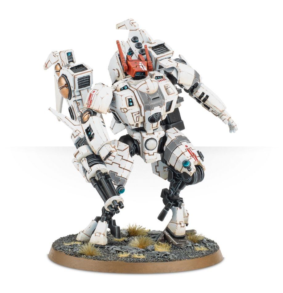 Boîte du T’au Commander pour Warhammer 40,000. Ce kit permet de monter un chef de guerre T’au en exo-armure avancée, avec diverses options d’armement et un drone de soutien.