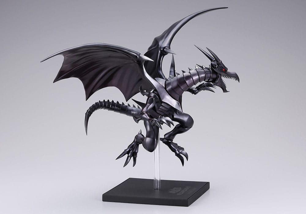 Figurine Yu-Gi-Oh! Oshi Works Dragon Noir aux Yeux Rouges de 24 cm, dragon noir aux ailes déployées sur socle transparent.