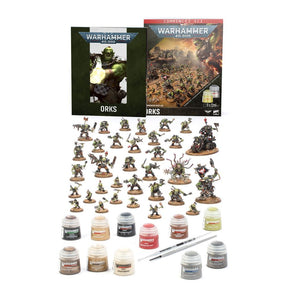 Coffret Warhammer 40,000 Commencer avec les Orks avec figurines Orks, livres, peintures Citadel et pinceau pour débuter une armée.