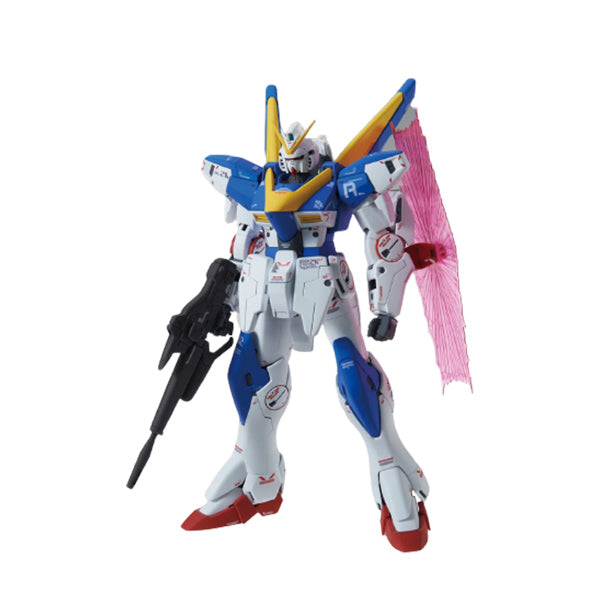 Maquette Gunpla MG 1/100 V2 Gundam Ver. Ka blanche, bleue, jaune et rouge avec fusil et effet d’aile rose sur fond blanc.