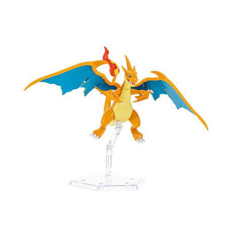 Boîte Pokémon Select Méga-Dracaufeu Y 15 cm avec figurine orange super articulée visible dans l’emballage.