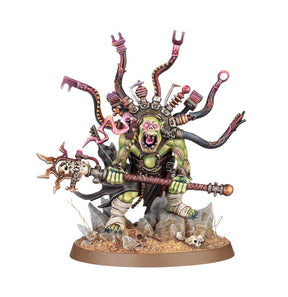 Figurine Warhammer 40,000 Orks Bizarboy, psyker ork avec bâton, câbles et équipement étrange sur socle décoré.