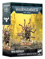 Figurine Warhammer 40,000 Orks Bizarboy, psyker ork avec bâton, câbles et équipement étrange sur socle décoré.