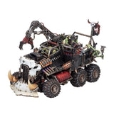Boîte Warhammer 40,000 Orks Trukk Kamion contenant 1 figurine Citadel de véhicule ork blindé avec pince mécanique, gros pneus et défenses massives.